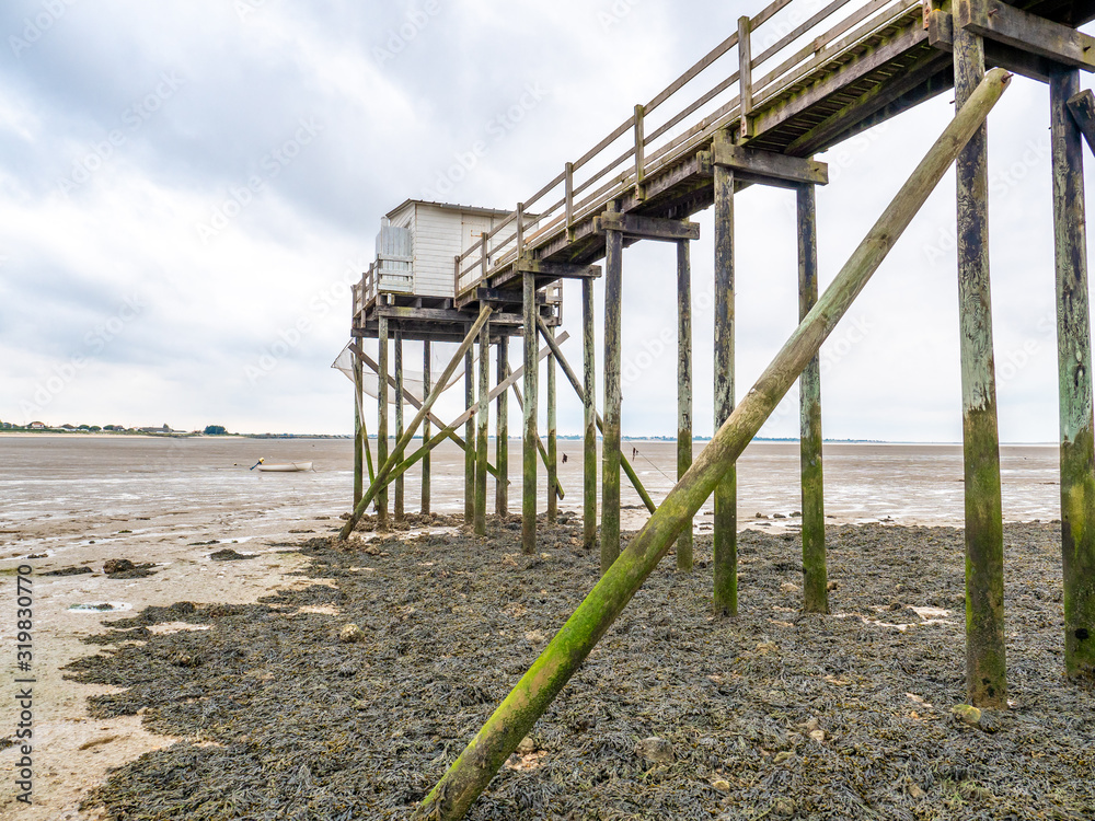 Fisherman's wharf in northern France, low low tide Fisherman's wharf in northern France, low low tide