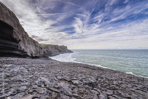 Ojerada cave on Ajo cape over Bay of Biscay of the northeast Atlantic Ocean in Cantabria, Spain photo