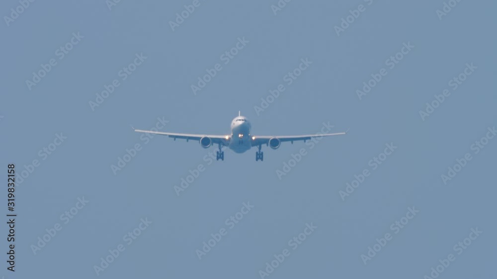 Widebody airplane approaching before landing Widebody airplane approaching before landing