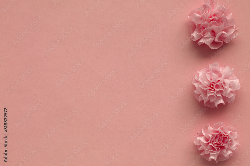 Pink flowers on the abstract background with copy space for text. holiday background. greeting card.