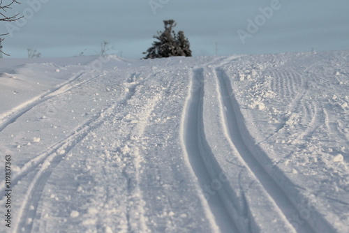 Ski track in snow , active winter holiday concept. © Stanislav