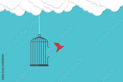 Flying bird and cage. Freedom concept. Emotion of freedom and happiness. Minimalist style.