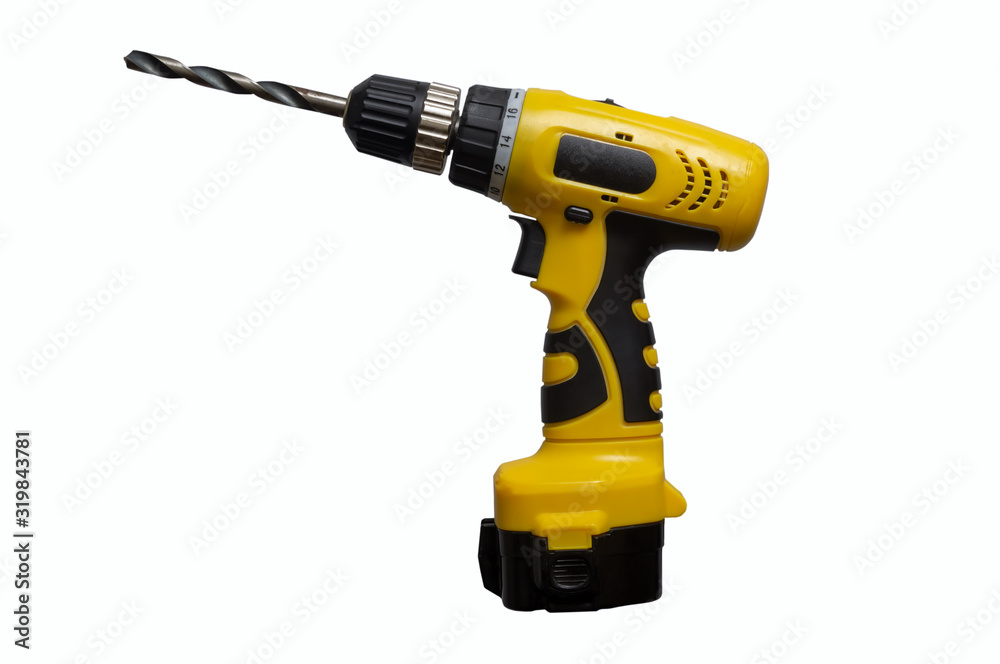 Yellow cordless drill with a drill isolate on a white background Yellow cordless drill with a drill isolate on a white background