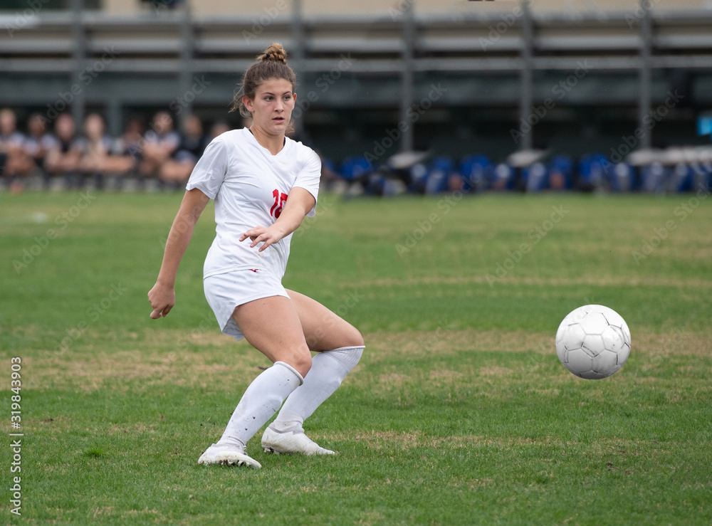 Girl Soccer player making exciting plays during a game