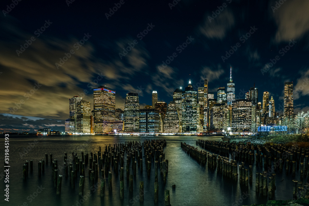 Night light Over East River Lower Manhattan Skyline View From Brooklyn Bridge Park