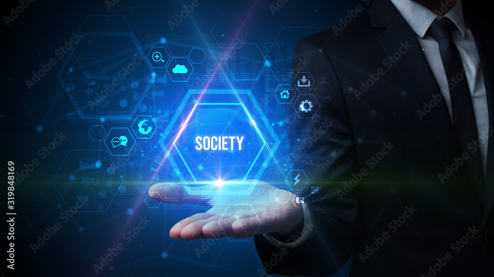 Man hand holding SOCIETY inscription, social media concept Man hand holding SOCIETY inscription, social media concept