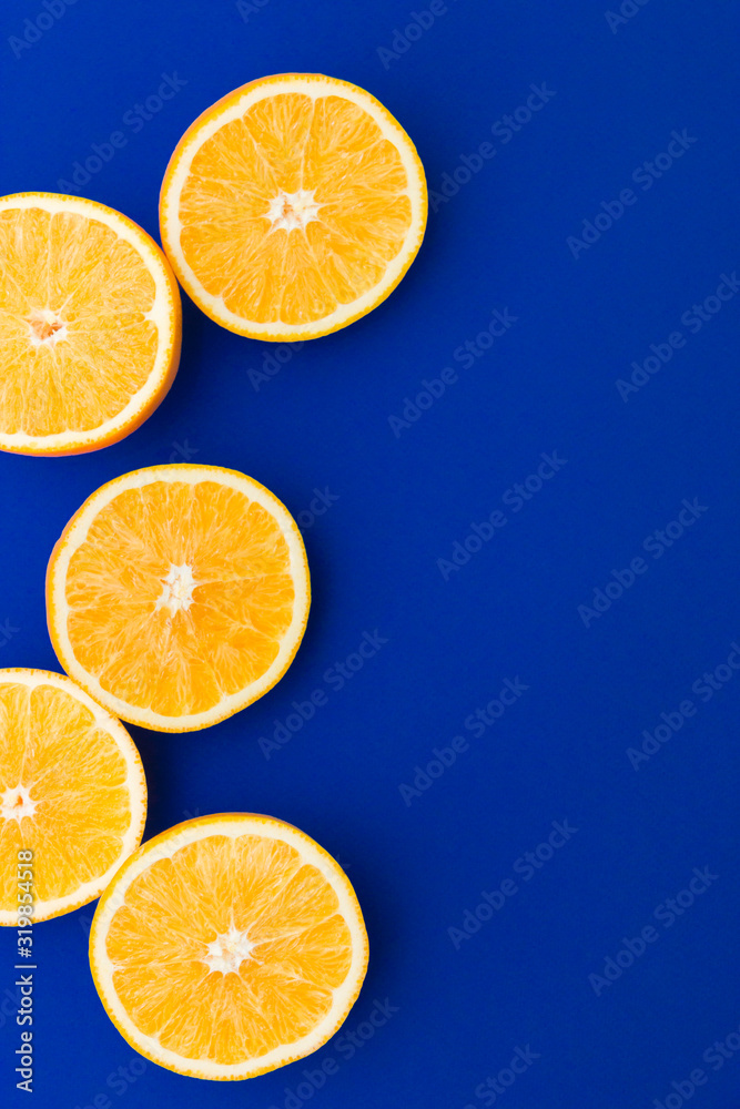 Close-up of a bunch of oranges sliced. Free space for text Close-up of a bunch of oranges sliced. Free space for text