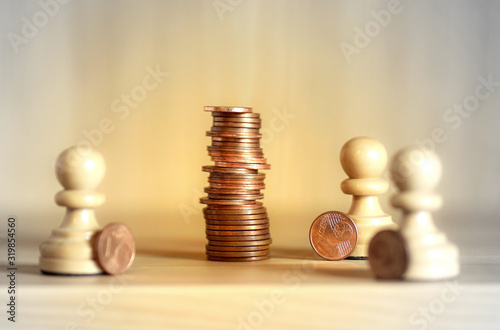 Crowdfunding concept- on a wooden background, three pawns saving money together