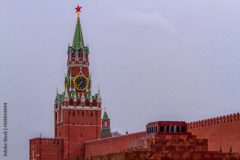 Moscow, Russia - March 22, 2019: Spasskaya Tower and the mausoleum on Red Square. Сity of Moscow, the capital of Russia. Moscow, Russia - March 22, 2019: Spasskaya Tower and the mausoleum on Red Square. Сity of Moscow, the capital of Russia.