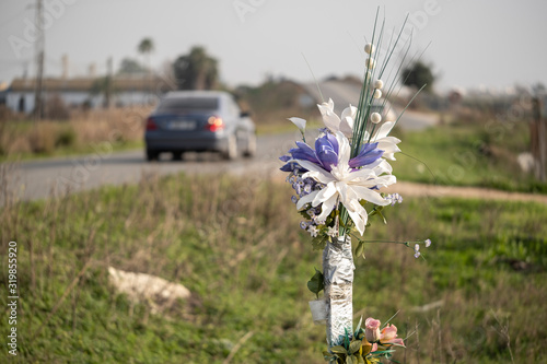Memorial bouquet at the site of a road accident