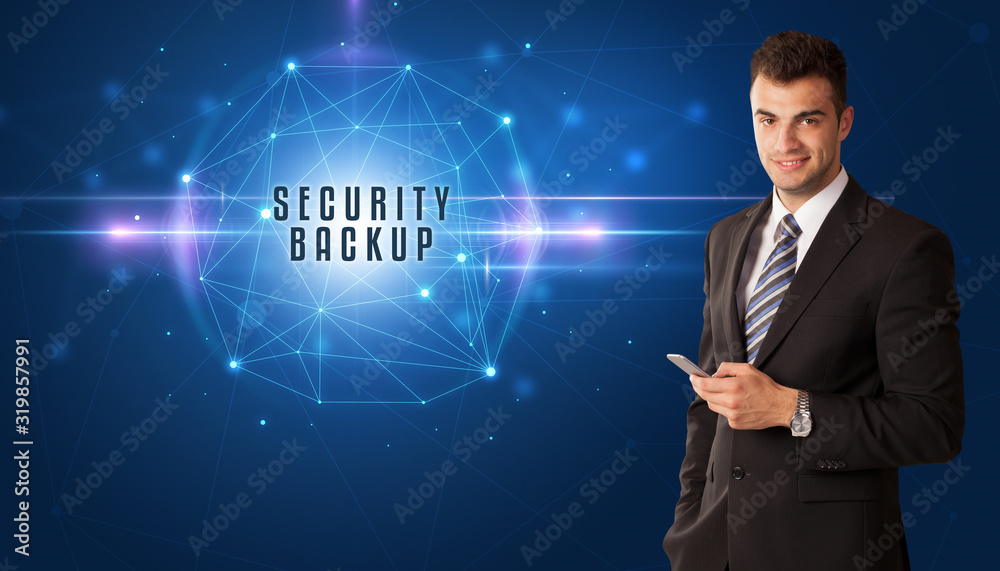 Businessman thinking about security solutions with SECURITY BACKUP inscription