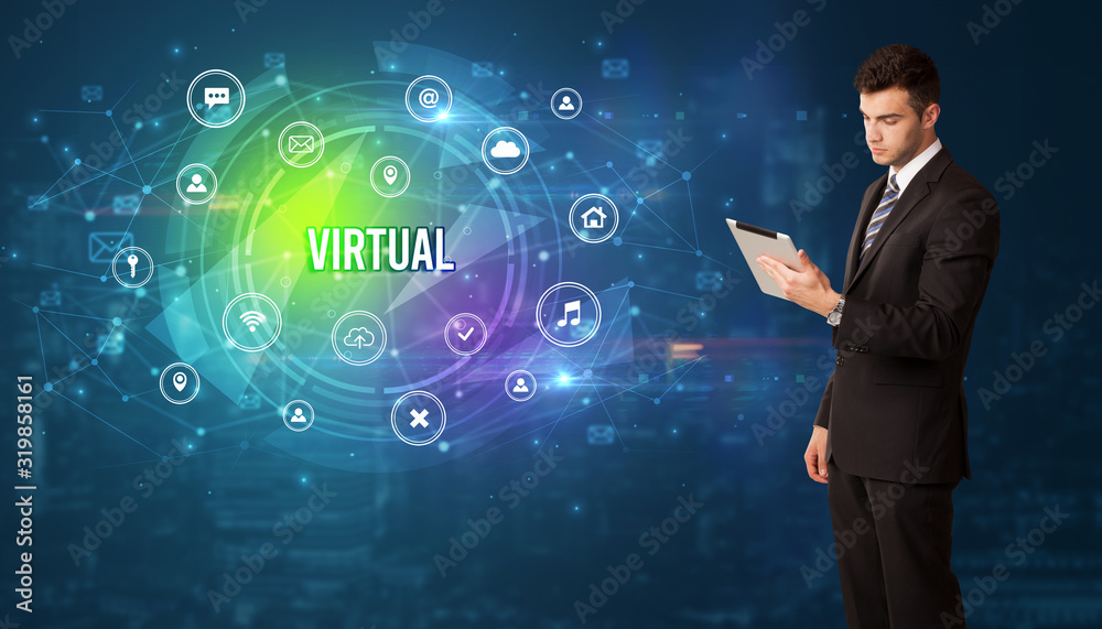 Businessman thinking in front of technology related icons and VIRTUAL inscription, modern technology concept