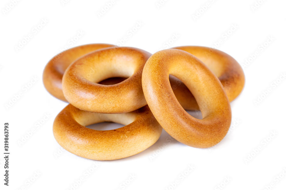 Small dry bagels, small rolls on a white background