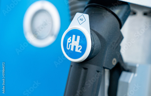 hydrogen logo on gas station. h2 combustion engine for emission free ecofriendly transport.