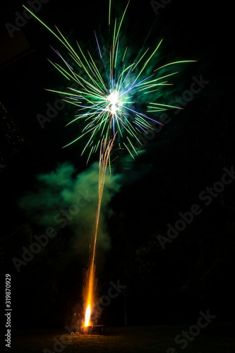 An amazing fireworks show during New Year s Eve celebration for the beginning of a happy new year on a nice Christmas in Spain  a colorful show in the night sky 