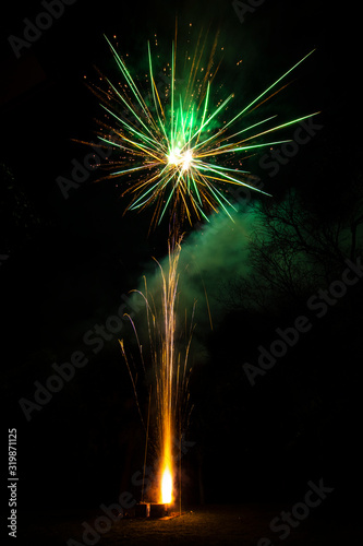 An amazing fireworks show during New Year s Eve celebration for the beginning of a happy new year on a nice Christmas in Spain  a colorful show in the night sky 