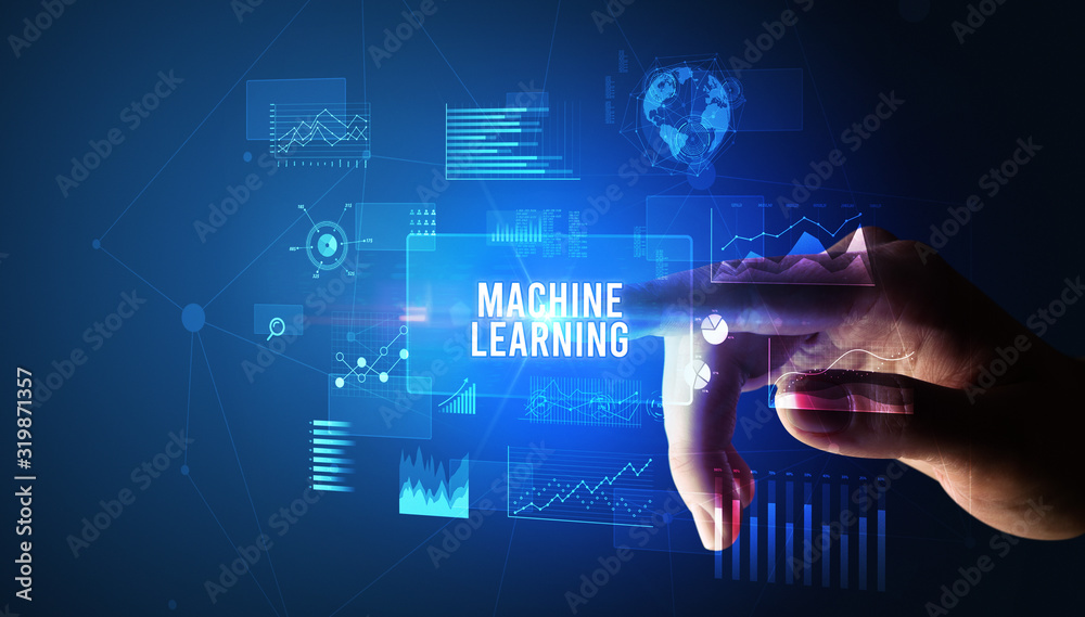 Hand touching MACHINE LEARNING inscription, new business technology concept Hand touching MACHINE LEARNING inscription, new business technology concept