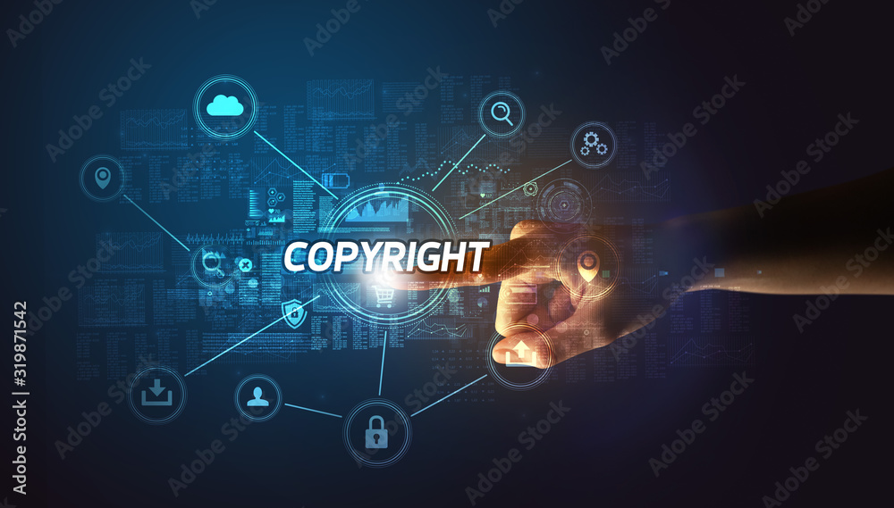 Hand touching COPYRIGHT inscription, Cybersecurity concept Hand touching COPYRIGHT inscription, Cybersecurity concept