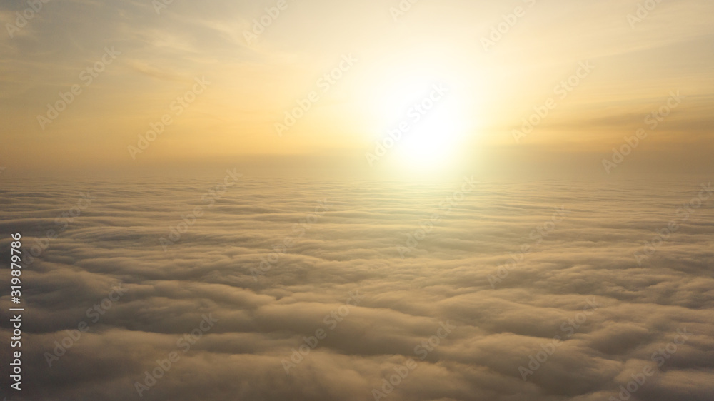 Fototapeta premium Yellow and blue dawn over clouds, concept, travel and leisure.