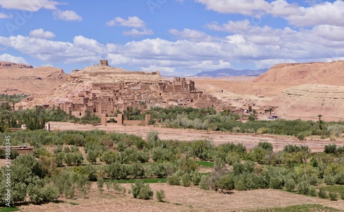 Ancient casbah of Tifoultoute with green gorge, surrounded by desert, Morocco, Africa photo