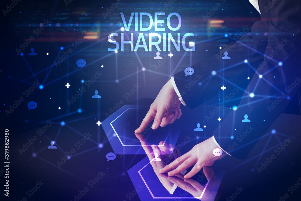 Navigating social networking with VIDEO SHARING inscription, new media concept Navigating social networking with VIDEO SHARING inscription, new media concept