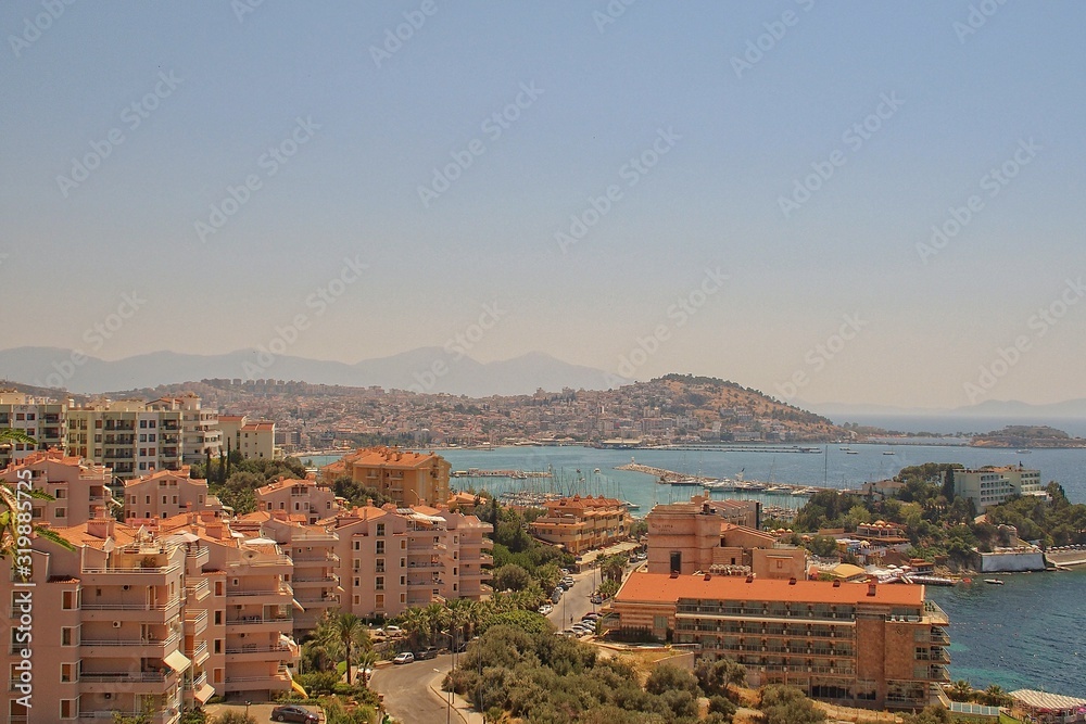  Turkish port city of Kusadasi on the Mediterranean Sea on a warm summer sunny day,