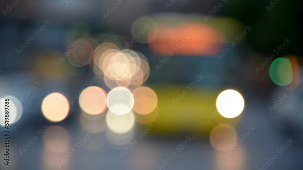 Abstract video of colored glitters produced by cars in the city Abstract video of colored glitters produced by cars in the city