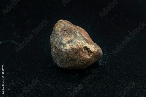 Chondrite Meteorite L6W2 Type isolated, piece of rock formed as an asteroid in the universe at during Solar System creation. The meteorite comes from an asteroid fall impacting Earth at Atacama Desert photo