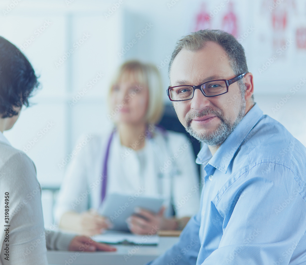 Fototapeta premium Smiling medical doctor and patient. Health care