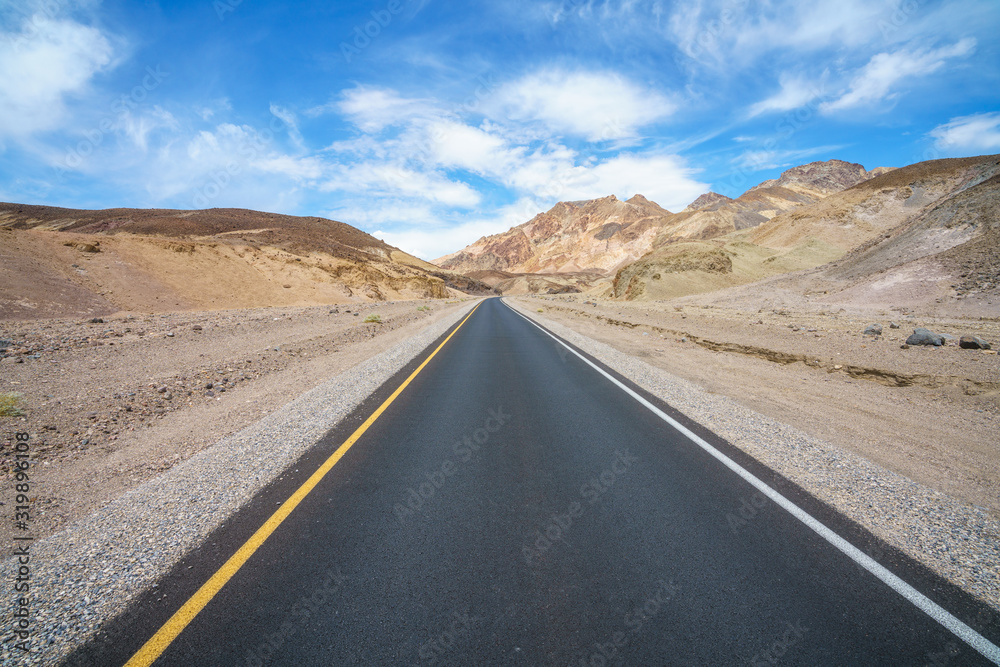 on the road on artists drive in death valley national park, california, usa on the road on artists drive in death valley national park, california, usa
