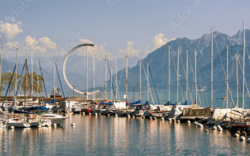 Lausanne, Switzerland - August 26, 2018: Marina and yachts on Lake Geneva in Lausanne, Ouchy fishing village, in Switzerland