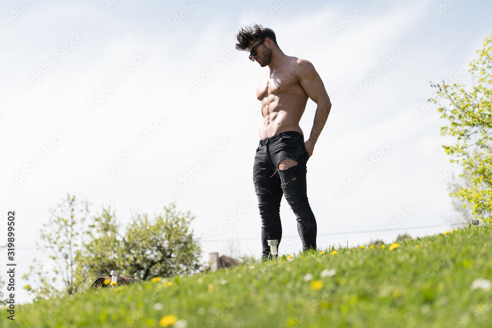 Man Standing Strong Outdoors in Nature Posing Man Standing Strong Outdoors in Nature Posing