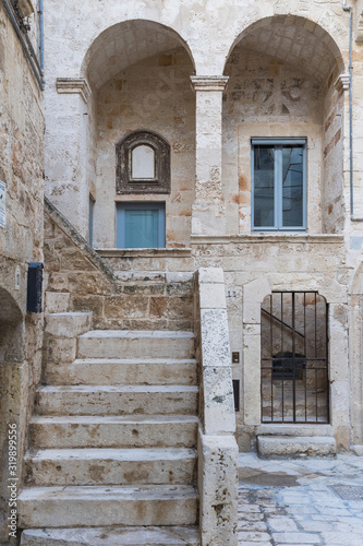 Architectural Detail of Stairway and Old Building Façade © gammaphotostudio