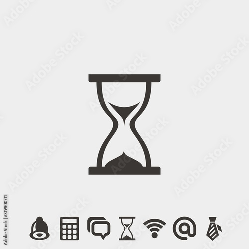 hour glass icon vector illustration and symbol foir website and graphic design photo