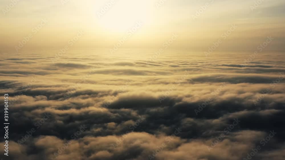Hyperlapse, above the clouds. The sun is slowly setting. Hyperlapse, above the clouds. The sun is slowly setting.