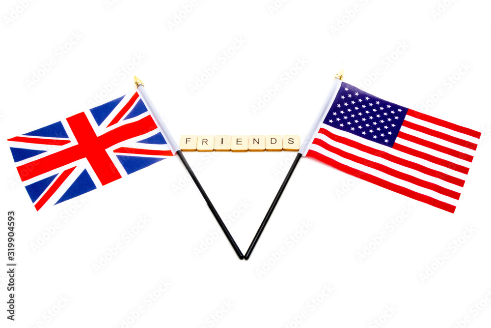 The flags of the United Kingdom and the United States isolated on a white background with a sign reading Friends The flags of the United Kingdom and the United States isolated on a white background with a sign reading Friends