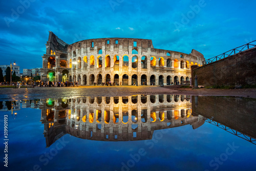Tela Roman Coliseum mirrored in the water in the blue hour