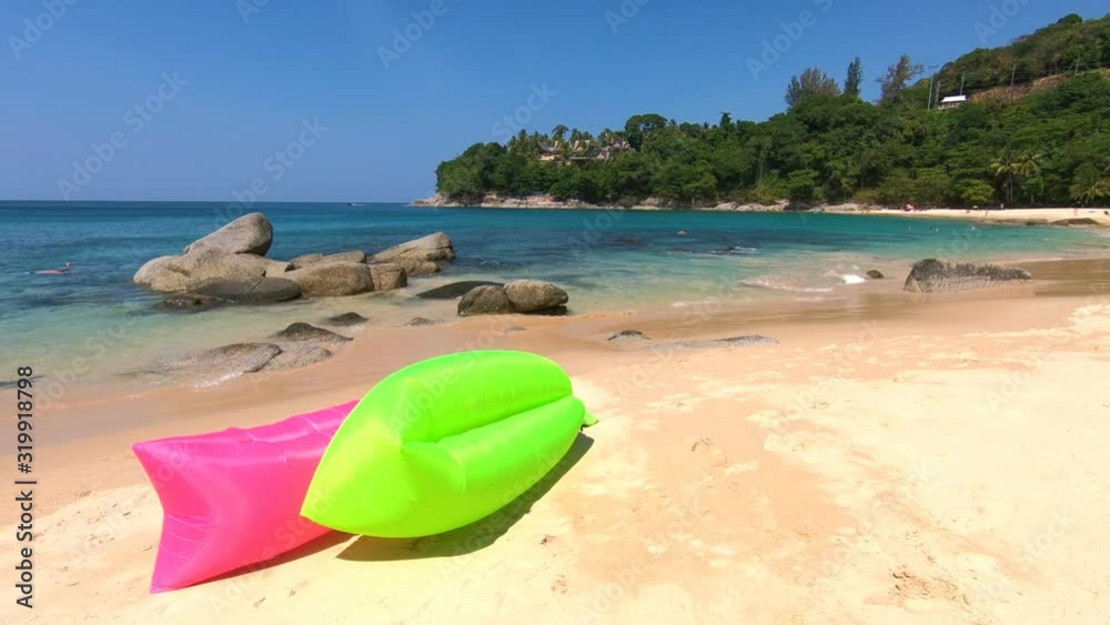 Landscape with bright inflatable beach sofas in Thailand Landscape with bright inflatable beach sofas in Thailand
