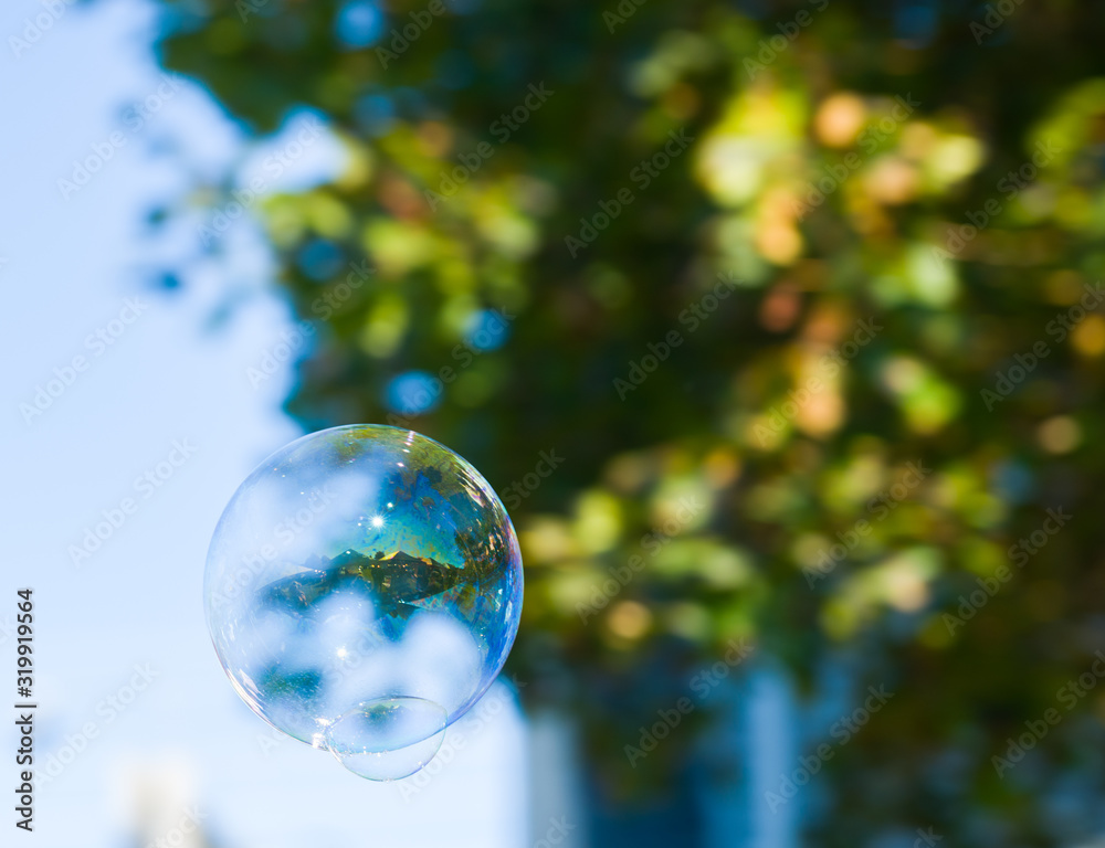 Bubble with House Inside Floating in Air Bubble with House Inside Floating in Air