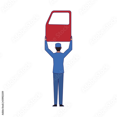 car mechanic holding up a car door
