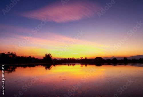 sunset over lake © bastoono