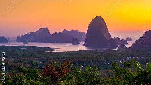 Sunrise at Samed Nangshe View Point, sea and mountain, Phang Nga Islands, Thailand, tilt up.