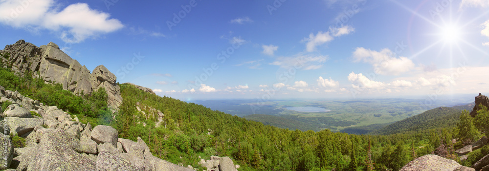 Mountain valley on a summer day, above the mountain valley, panorama landscape