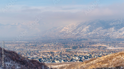 Panorama Mountain with grasses and blanketed with fresh snow on a cold winter day