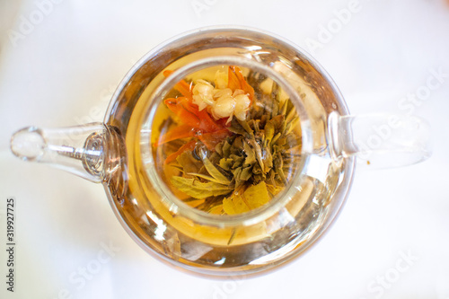 Flowering Tea in Clear Tea Pot