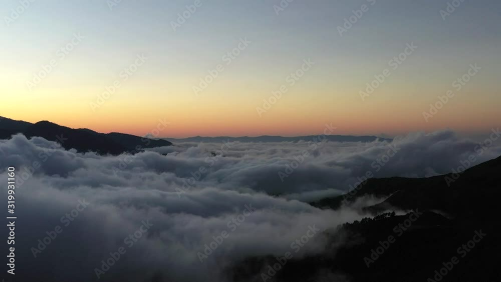 Early morning fog clinging to the mountain range in the rural south of Costa Rica