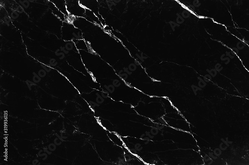 Black marble with white veins curly seamless patterns on cracked dark background