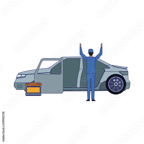 Car mechanic standing and car body and battery