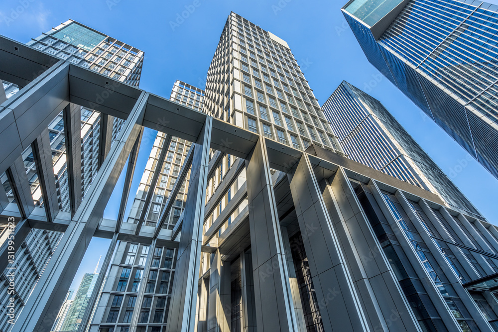 Modern office building on a clear sky background.