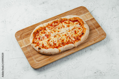 pizza with mazarella, cheese on a crust photo